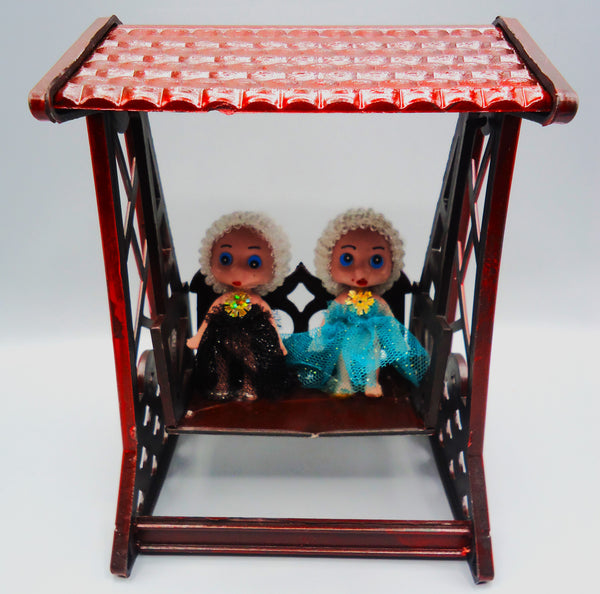 Little Dolls in Toy Swing Wood
